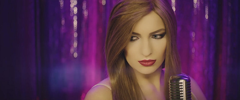 Кадр из клипа на песню «Я Буду Зажигать» Мария Миа и Стас Костюшкин